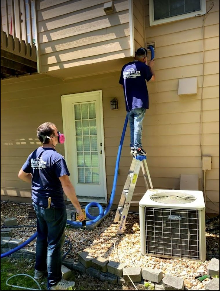 Atlanta Air Pro Technicians Cleaning Dryer Vent Duct for Fire Safety