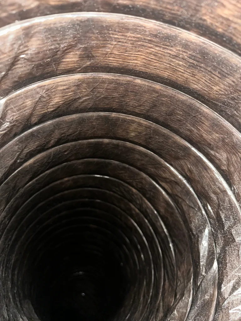 cleaned flexible duct interior after dust removal